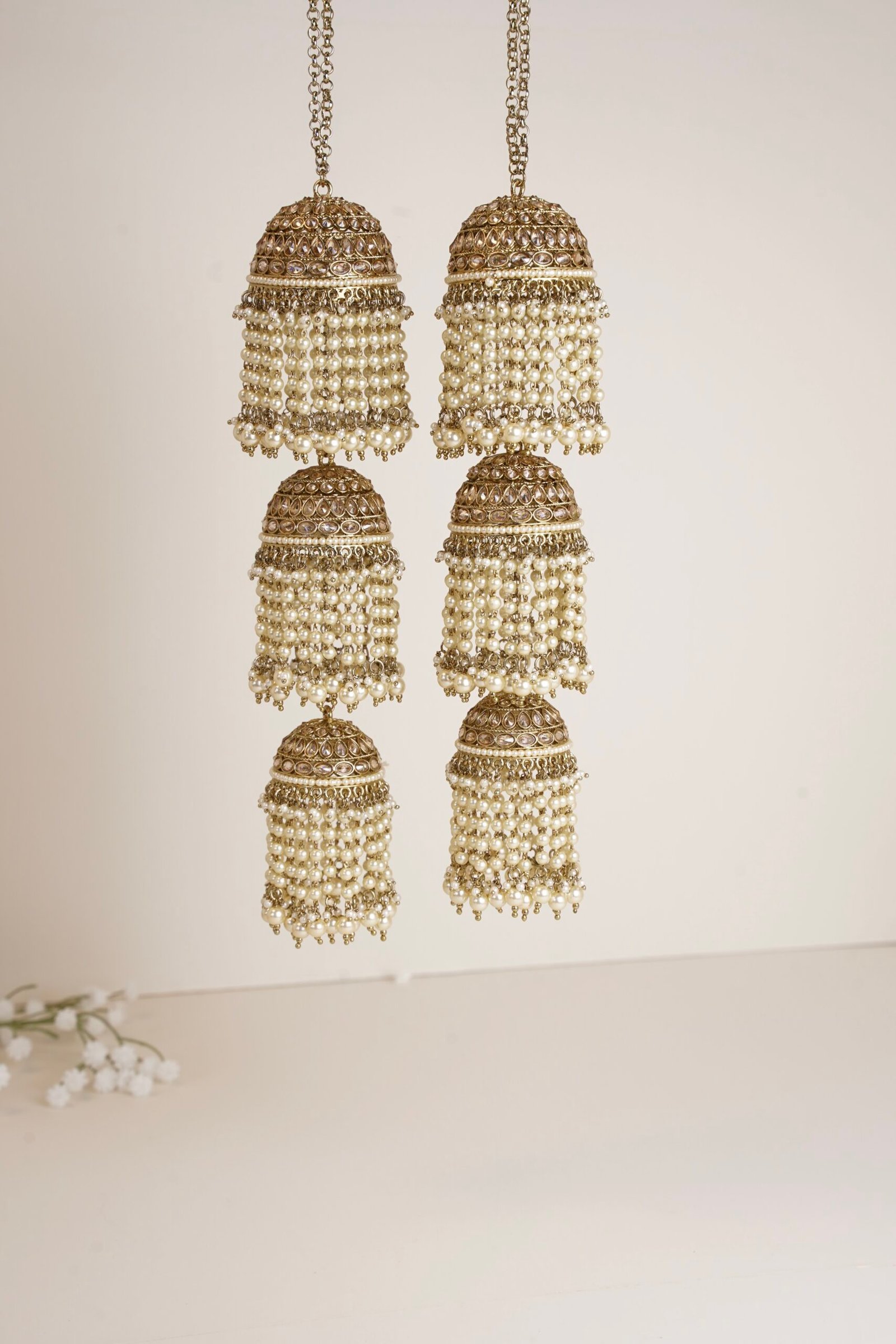 Modern statement bridal kaleerey with three tier jhumkis