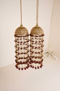 Handcrafted South Asian bridal kaleerey with maroon beads