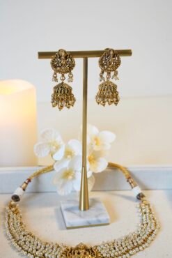Temple necklace set paired with matching earrings, perfect for weddings and festivals
