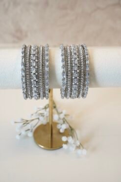 Colorful customizable bangle set with mix and match stackable bangles in vibrant shades and gold accents