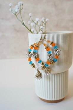 Multicolor jhumka hoop earrings with vibrant stones, perfect for mehendi night and festive occasions
