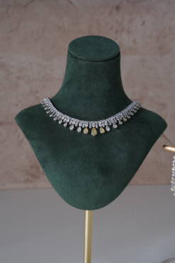 Delicate two tone American diamond necklace set with matching earrings, featuring sparkling stones in a soft feminine design