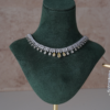 Delicate two tone American diamond necklace set with matching earrings, featuring sparkling stones in a soft feminine design