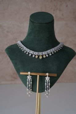 Delicate two tone American diamond necklace set with matching earrings, featuring sparkling stones in a soft feminine design