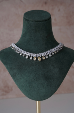 Delicate two tone American diamond necklace set with matching earrings, featuring sparkling stones in a soft feminine design