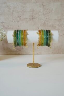Forest-inspired Kashmiri raindrop glass bangle stack in light green, mehndi green, mint, and soft yellow, ideal for weddings, festive occasions, and traditional Indian or Pakistani outfits