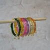Colorful Rangeela Kashmiri glass bangle set featuring vibrant jewel tones and ghungroo accents, ideal for bridal, festive, or traditional Indian and Pakistani occasions