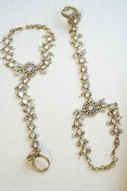traditional Pakistani and Indian style Kundan hathphool bracelet with adjustable finger rings, styled for a luxury South Asian wedding