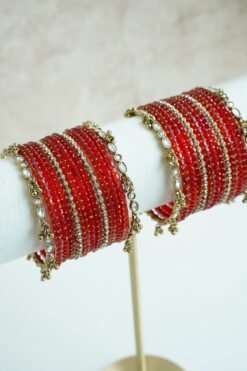 Red Glass bangle stack with delicate ghungroo accent bangles for weddings, mehendi events, and festive wear.