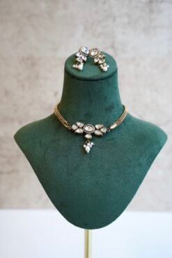 Dainty mini Kundan necklace with an adjustable chain and a pair of matching classic earrings by Seyora Jewels.