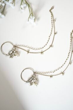 Mehndi polish Kundan nath featuring a lotus design, hanging pearl, and two-layer pearl chain by Seyora Jewels.