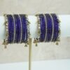 Blue glass bangle stack with delicate ghungroo accent bangles for weddings, mehendi events, and festive wear.