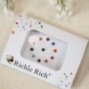 Multi color bindis with matching color stone settings.