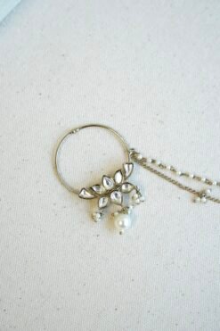Mehndi polish Kundan nath featuring a lotus design, hanging pearl, and two-layer pearl chain by Seyora Jewels.