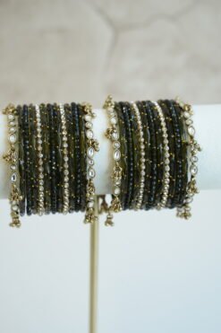 Mehndi green glass bangle stack with delicate ghungroo accent bangles for weddings, mehendi events, and festive wear.