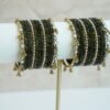 Mehndi green glass bangle stack with delicate ghungroo accent bangles for weddings, mehendi events, and festive wear.