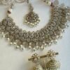 Tanya champagne stone necklace set with pearl beads and matching jhumka earrings and tikka - South Asian bridal jewelry